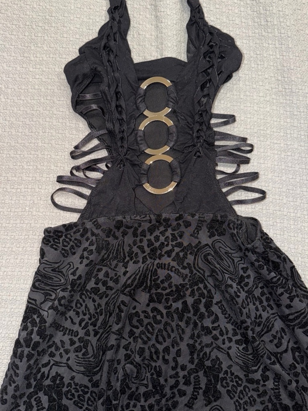 Outcast dress with leopard print and cut outs!